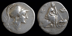 Anonymous, AR denarius, issued 115-114 BCE. Rome, 3.79g, 21mm.
Obv: ROMA, helmeted head of Roma right; X behind.
Rev: Helmeted Roma seated right on tw...