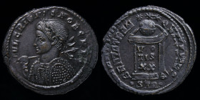 Crispus (316-326) AE3 or follis, issued 322-323. Trier, 3.04g, 20.5mm.
Obv: IVL CRISPVS NOB CAES; laureate, cuirassed bust left, spear in right hand o...