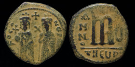 Phocas, with Leontia (602-610) AE follis, dated RY 5 (606/7). Antioch, 9.32g, 27mm.
Obv: DN FOCA NE PE AV legend with Phocas on the left, holding cros...