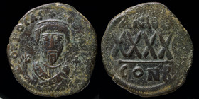 Phocas (602-610) AE follis, issued 607-608. Constantinople, 12.08g, 29mm.
Obverse: DN FOCAS PЄRP AUC; Crowned bust facing, wearing consular robes, hol...
