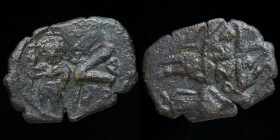 Heraclius, with Heraclius Constantine (610-641) AE half follis, issued 630-40. Constantinople, 3.65g, 18-25mm.
Obv: Crowned figures of Heraclius, in m...