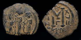 ARAB-BYZANTINE, Rashidun Caliphate, AE fals, c. 637-643, Imitating a follis of Cyprus. Uncertain mint in Syria, 4.40g, 26mm.
Obv: Three imperial figur...
