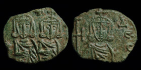 Constantine V (741-775) AE Follis, issued 757-775. Syracuse, 2.34g, 19.5mm.
Obv: K ΛEWN Crowned, facing busts of Constantine V and Leo IV, cross betwe...