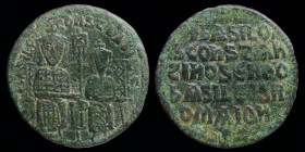 Basil I the Macedonian, with Constantine (867-886) AE follis. Constantinople, 6.44g, 25.5mm.
Obv: + ЬASILO S COҺST ЬASILIS; Basil and Constantine seat...