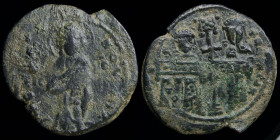 Constantine X and Eudocia (1059-1067) AE follis. Constantinople, 8.88g, 31.5mm.
Obv: + EMMA-NOVHΛ - Christ standing facing on footstool, wearing nimbu...