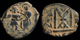 ARAB-BYZANTINE: Rashidun, AE fals, Two Standing Figures, ca. 634-640s. Neapolis (Nablus in Palestine), 6.05g, 20-22mm.
Obv: Cross between two standing...