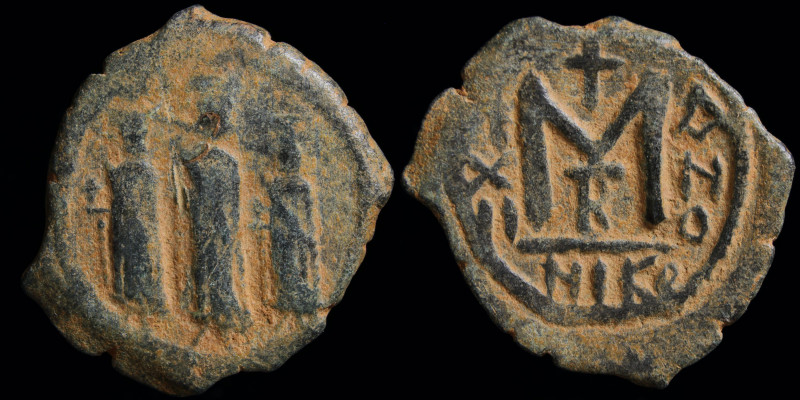 ARAB-BYZANTINE: Rashidun Caliphate, AE fals, Three standing figures c. 637-643. ...