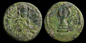 UMAYYAD: 'Abd al-Malik ibn Marwan, AE fals, Standing caliph type, issued c. 690s. Damascus, 2.73g, 17mm. 
Obv: Caliph standing facing, holding on shea...