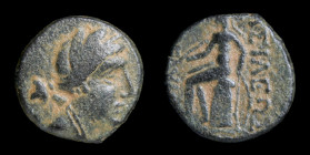 SELEUKID KINGDOM: Seleukos III (225/4-222 BCE), AE 13. Antioch, 3.34g, 13mm.
Obv: Head of Artemis r. 
Rev: Apollo seated l. on omphalos, holding bow a...