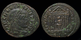 Maxentius (306-312) AE follis, issued 310-11. Rome, 6.55g, 25.5mm.
Obv: IMP C MAXENTIVS P F AVG; laureate head right
Rev: CONSERV VRB SVAE, Roma seate...