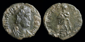 Theodora (died before 337), AE follis, issued 337-340. Trier, 1.34g, 15mm.
Obv: Mantled bust right
Rev: Pietas standing facing, holding child; TRP•. 
...