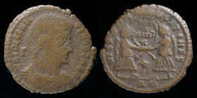 Decentius as Caesar (350-353), AE centenionalis, issued 350-51. Rome, 3.80g. 
Obv: Bare-headed and cuirassed bust right; Γ behind
Rev: Two Victories s...