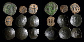 Byzantine group (9 coins): includes Justin I follis, Constans II follis and half follis, Arab-Byzantine fals, Andronicus I trachy, Manuel I trachy, Is...
