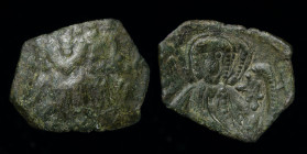 Latin Rulers of Constantinople (1204-1261) AE Trachy, clipped to a small module, issued 1225-35. Constantinople, 1.00g, 13-17mm. 
Obv: Facing bust of ...