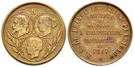 France. Napoleon III. Medal. 1867. Anv.: Three medallions with the heads of Napoleon III, Eugenie and the Imperial Prince, above N radiant. Rev.: S.A....