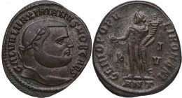 305-11 d.C.. Galerio Maximiano. Antioquía. Folis. Ae. 9,30 g.  GAL VAL MAXIMIANVS NOB CAES. Busto con corona de laurel a la derecha.
Espaldas: GENIO P...