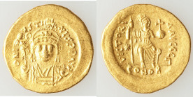 Justin II (AD 565-578). AV solidus (20mm, 4.49 gm, 6h). XF. Constantinople, 3rd officina. D N I-VSTI-NVS P P AVG, helmeted, cuirassed bust of Justin I...