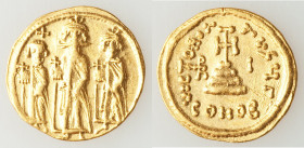 Heraclius (AD 610-641), with Heraclius Constantine and Heraclonas. AV solidus (20mm, 4.39 gm, 6h). XF, graffiti. Constantinople, 3rd officina, ca. AD ...