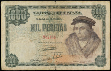 Spanish Banknotes
Estado Español
1.000 Pesetas. 19 Febrero 1946. Luis Vives. (Roturas y escritura en tinta). Ed-453. BC+.