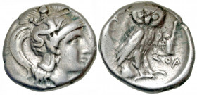 Calabria, Tarentum. Ca. 302-280 B.C. AR drachm (16.4 mm, 3.15 g, 12 h). Helmeted head of Athena right; helmet decorated with skylla hurling a stone / ...