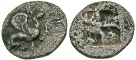Ionia, Teos. Ca. 450-425B.C.. AR tetartemorion (8.7 mm, .36 g). Griffin seated right, raising forepaw / Quadripartite incuse square. Matzke 100; SNG K...