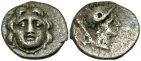 Pisidia, Selge. Ca. 350-300 B.C. AR obol (11.2 mm, 0.78 g, 12 h). Facing gorgoneion / Helmeted head of Athena right; spear over shoulder, astralagos b...