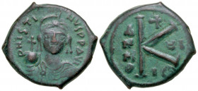Justin II. 565-578. AE follis (21.9 mm, 5.64 g, 5 h). Thessalonica mint, dated RY 7 = 571/2. D N IVSTINIANVS P P AV, helmeted and cuirassed facing bus...
