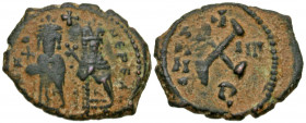 Phocas. 602-610. AE decanummium (18.3 mm, 2.04 g, 7 h). Antioch mint, dated RY 4 = 605/6. O N FOCA NЄ PЄ AV, Phocas on left and Leontia on right, stan...
