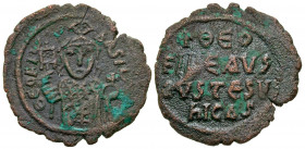 Theophilus. 829-842. AE half follis (27.1 mm, 4.75 g, 7 h). Constantinople mint. ЄOFIL' bASIL', three-quarter length figure of Theophilus standing fac...