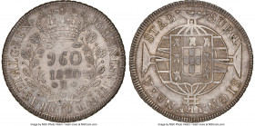 João VI 960 Reis 1820-R AU55 NGC, Rio de Janeiro mint, KM326.1, LMB-478. Struck over a Chilean "Volcano" Peso 1815 (cf. KM82.2). An always sought-afte...