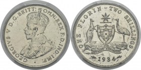 Australie
 Georges V (1910-1936)
 Epreuve sur flan bruni du 1 florin / 2 shillings - 1934 Melbourne.
 Rarissime - 100 exemplaires - Trace de vernis...