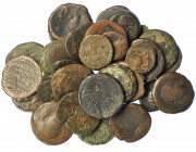 HISPANIA ANTIGUA. Lote de 34 monedas de Obulco: doble, unidad (6), ases (20, uno de ellos partido y otro con agujero), semis (7). De BC a MBC-.