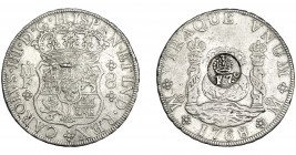COLECCIÓN DE RESELLOS. FILIPINAS. 8 reales. Resello F 7º coronado sobre 8 reales 1768 México MF. KM-59. MBC. Rara.