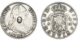 COLECCIÓN DE RESELLOS. GRAN BRETAÑA. 1/2 dólar. Resello busto de Jorge III dentro de óvalo sobre 4 reales 1780 Sevilla CF. KM-622.2. MBC.