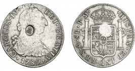 COLECCIÓN DE RESELLOS. GRAN BRETAÑA. Dólar. Resello busto de Jorge III dentro de óvalo sobre 8 reales 1789 México FM. KM-625. MBC.