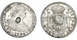 COLECCIÓN DE RESELLOS. GRAN BRETAÑA. Dólar. Resello busto de Jorge III dentro de óvalo sobre 8 reales 1794 México FM. KM-634. MBC+.