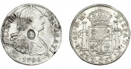 COLECCIÓN DE RESELLOS. GRAN BRETAÑA. Dólar. Resello busto de Jorge III dentro de óvalo sobre 8 reales 1795 México FM. KM-634. Oxidaciones. MBC+.