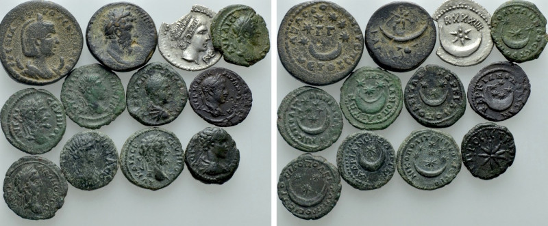 12 Roman Provincial Coins; all With Astronomical Depictions. 

Obv: .
Rev: ....