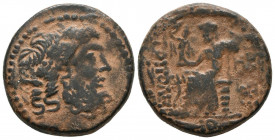 REINO SELEUCIDA. Ae (Ae. 10,15g/23mm). Siglo I a.C. Antioquía. (RPC I 4216). Anv: Cabeza laureada de Zeus a derecha. Rev: Zeus sentado a izquierda, so...