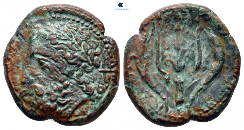 Sicily. Messana circa 324-318 BC. 
Litra Æ

21 mm, 6,13 g

Laureate head of...