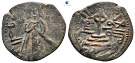 Arab-Byzantine. tanukh. Time of Abd al-Malik ibn Marwan AH 65-86. Fals Bronze