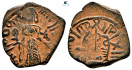 Arab-Byzantine. Qinnasrin. Standing Caliph AD 692-697. Fals Bronze