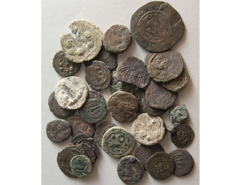 Group Lot of 34 Mostly Sasanian and a few Parthian Bronzes. Average Grade Fine a...