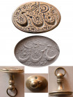 ISLAMIC ANTIQUE SEALS. Brass Seal with silver handle.