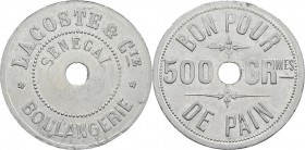 Sénégal
 Monnaie de nécessité en aluminium « Bon pour 500g. de pain » - Non daté Dakar.
 Boulangerie Lacoste & Cie.
 Superbe à FDC
 100 / 200...