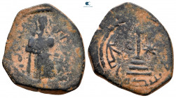 Time of Abd al-Malik ibn Marwan AH 65-86. From the Tareq Hani Collection.
. Antakiya (Antioch in Syria). Fals Bronze