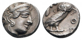 ATTICA. Athens.(Circa 454-404 BC).Tetradrachm.

Obv: Helmeted head of Athena right, with frontal eye.

Rev: AΘE.
Owl standing right, head facing; oliv...