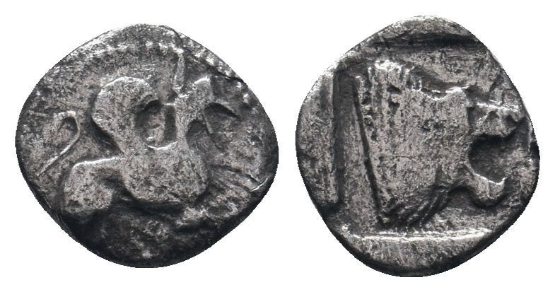 TROAS. (500-450 BC).Obol.Assos.

Obv : Griffin seated right, raising forepaw.

R...