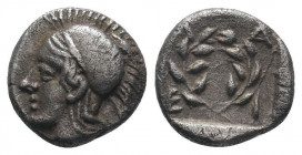 AEOLIS.(Circa 350-320 BC).Obol.Elaia.

Obv : Helmeted head of Athena left, pellet behind.

Rev : EΛA.
Olive wreath.
SNG Kayhan 81.

Condition : Good v...