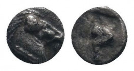 IONIA or CARIA. Uncertain.(Circa 5th century BC).Tetartemorion.

Obv : Head and neck of bull left, with head facing.

Rev : Incuse square punch.
SNG K...